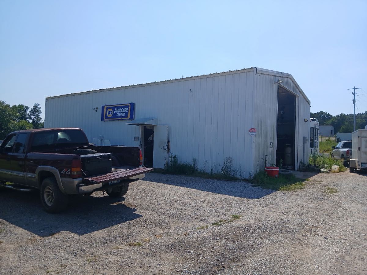 North End Auto LLC shop building, a NAPA AutoCare Center, with a truck parked out front